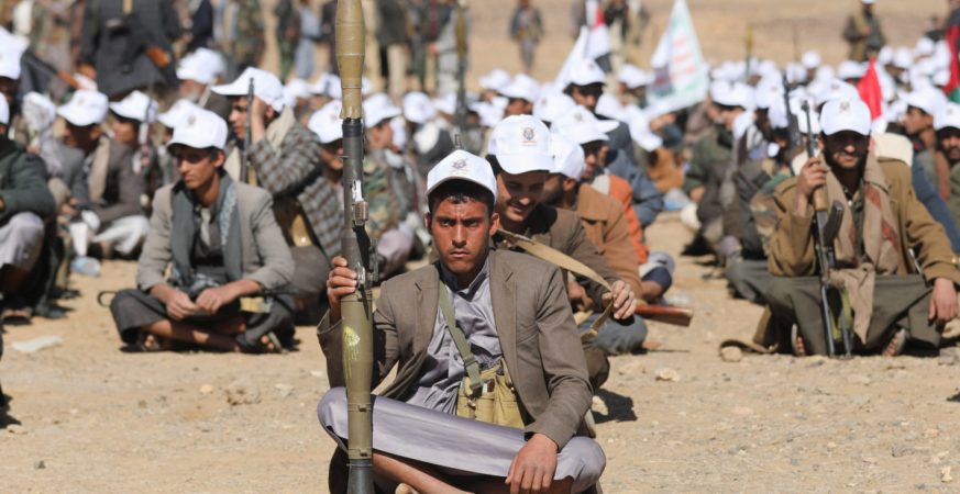 Houthi sitting during a military parade