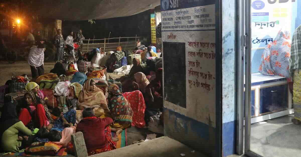 People-wait-to-cross-the-border-at-Hakimpur-in-North-24-Parganas-district-in-West-Bengal.-